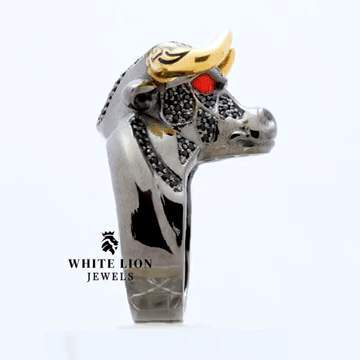 Golden Horned Bull Taurus Ring in 925 Silver with Black Onyx design, angled view.