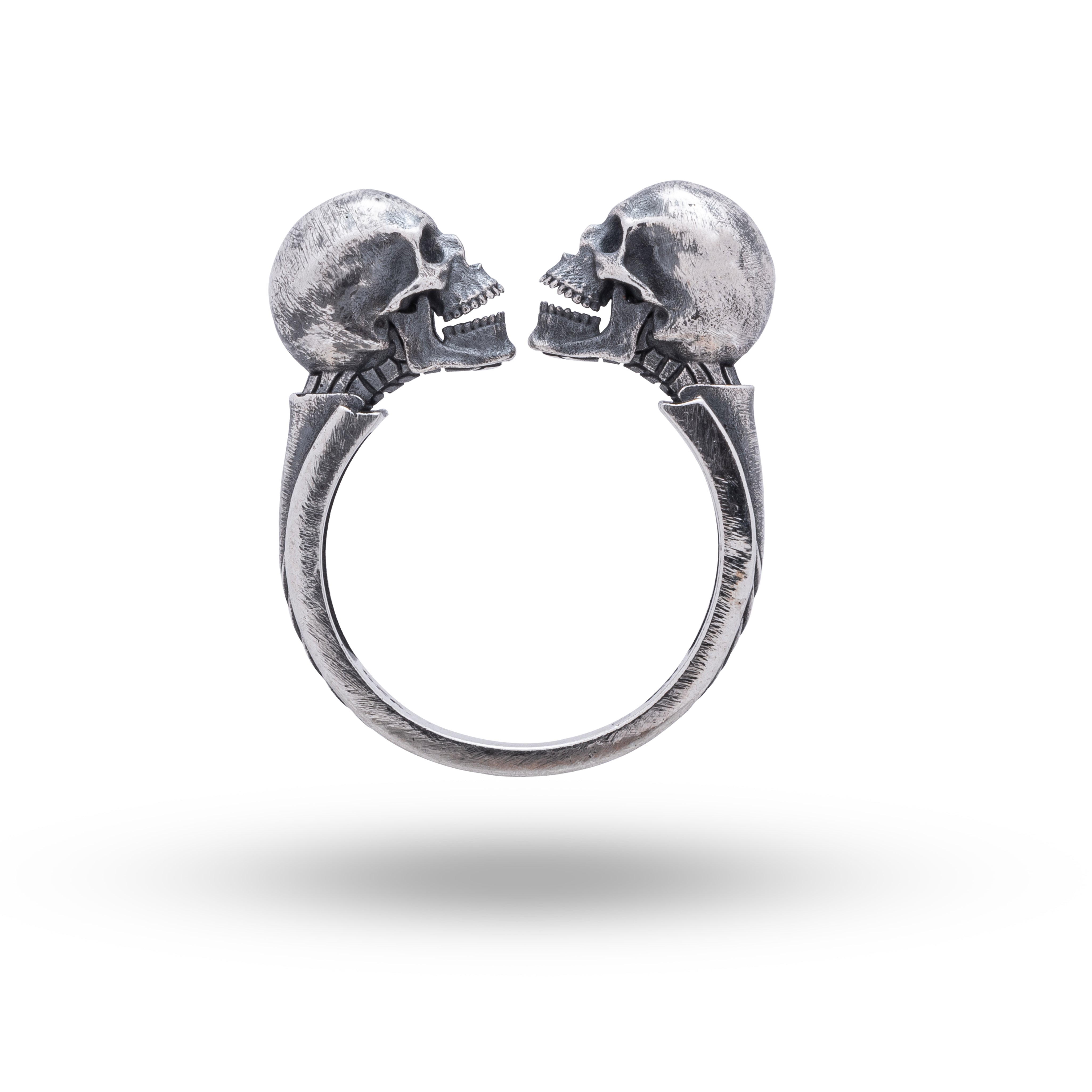 Side view of the Open Jaw Twin Skull 925 Sterling Silver Ring showcasing oxidized finish and twin skull design.