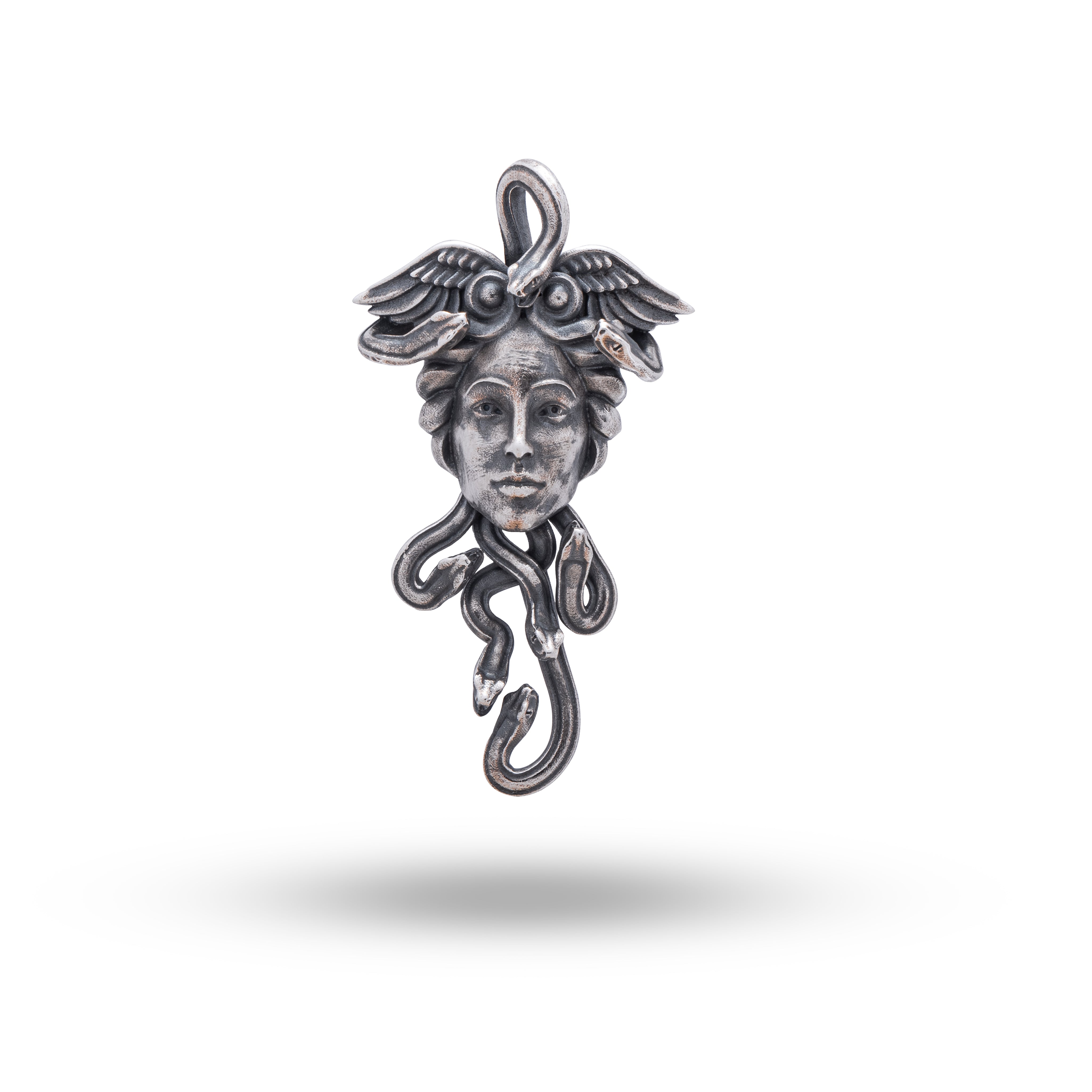 Sterling Silver Pendant featuring Medusa and snake motif with oxidized finish, viewed from angle one.