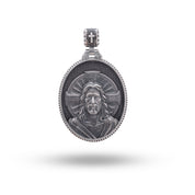 Front view of the Jesus 925 Sterling Silver Pendant with an oxidized finish, showcasing its intricate design and oval shape