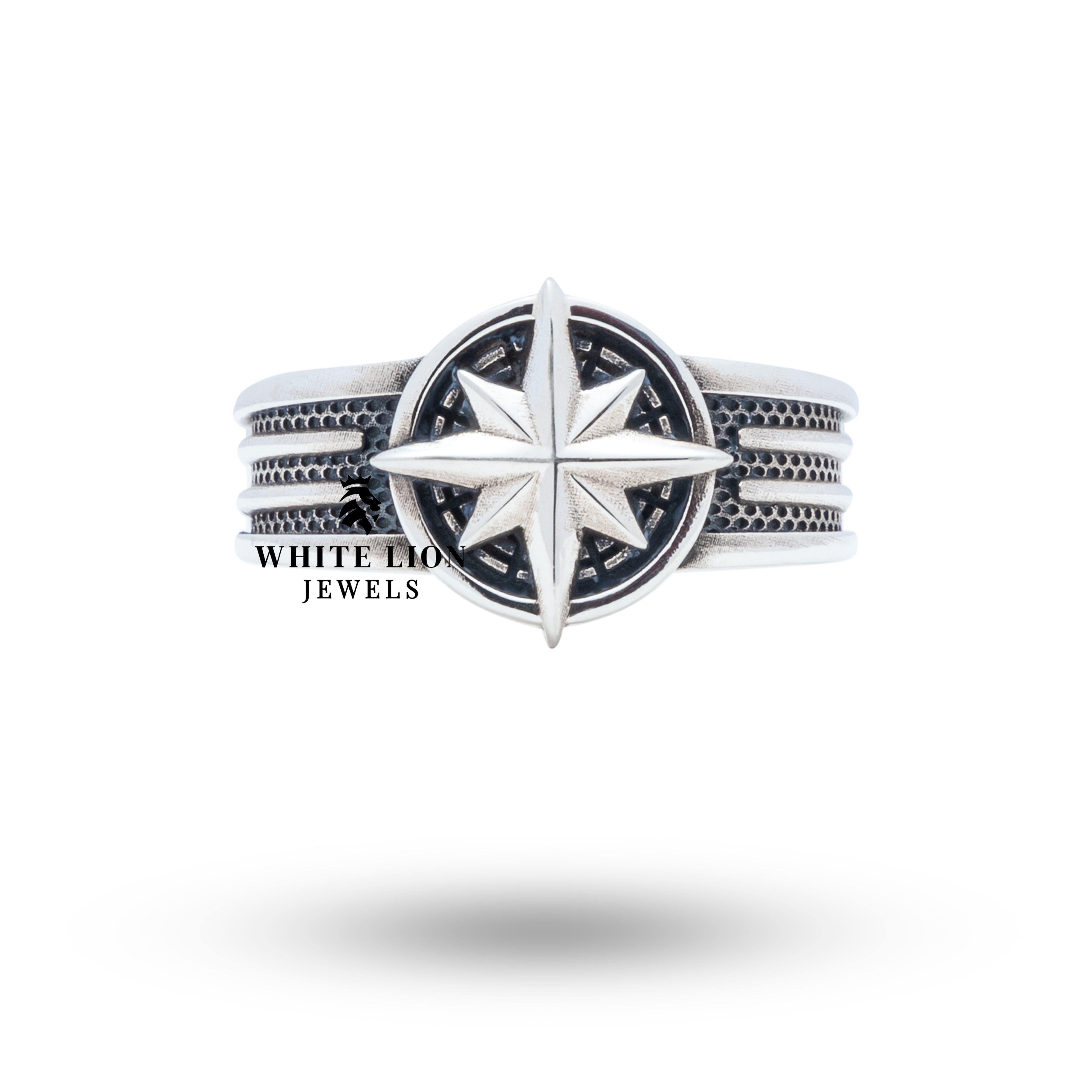 Side profile showing detailed Wind Rose motif on sterling silver ring