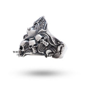 Kali Skulls Gothic 925 Sterling Silver Ring shown in gothic-themed setting, showcasing its dramatic appeal.