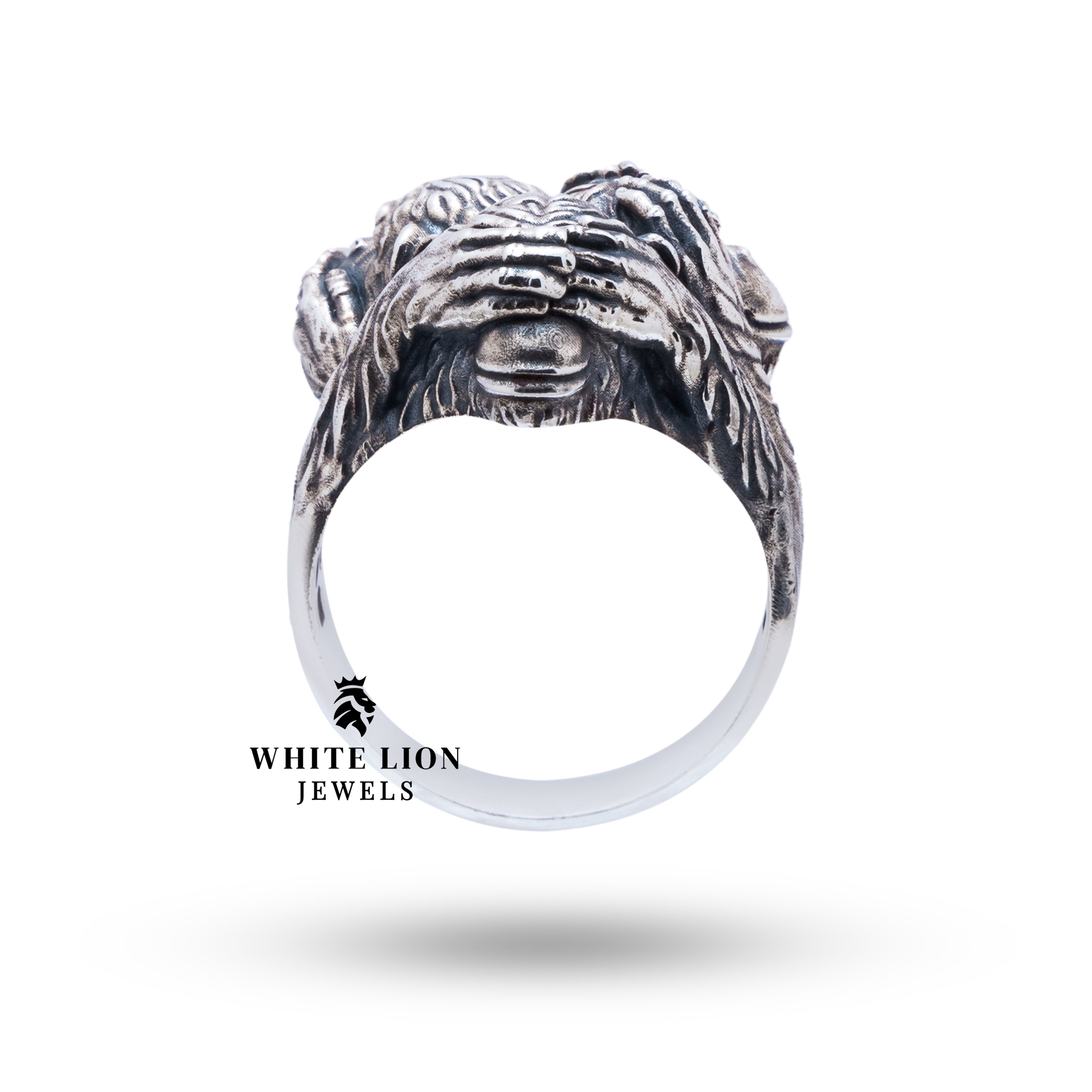 Sterling Silver Ring showcasing cultural symbolism with wise monkeys motif.