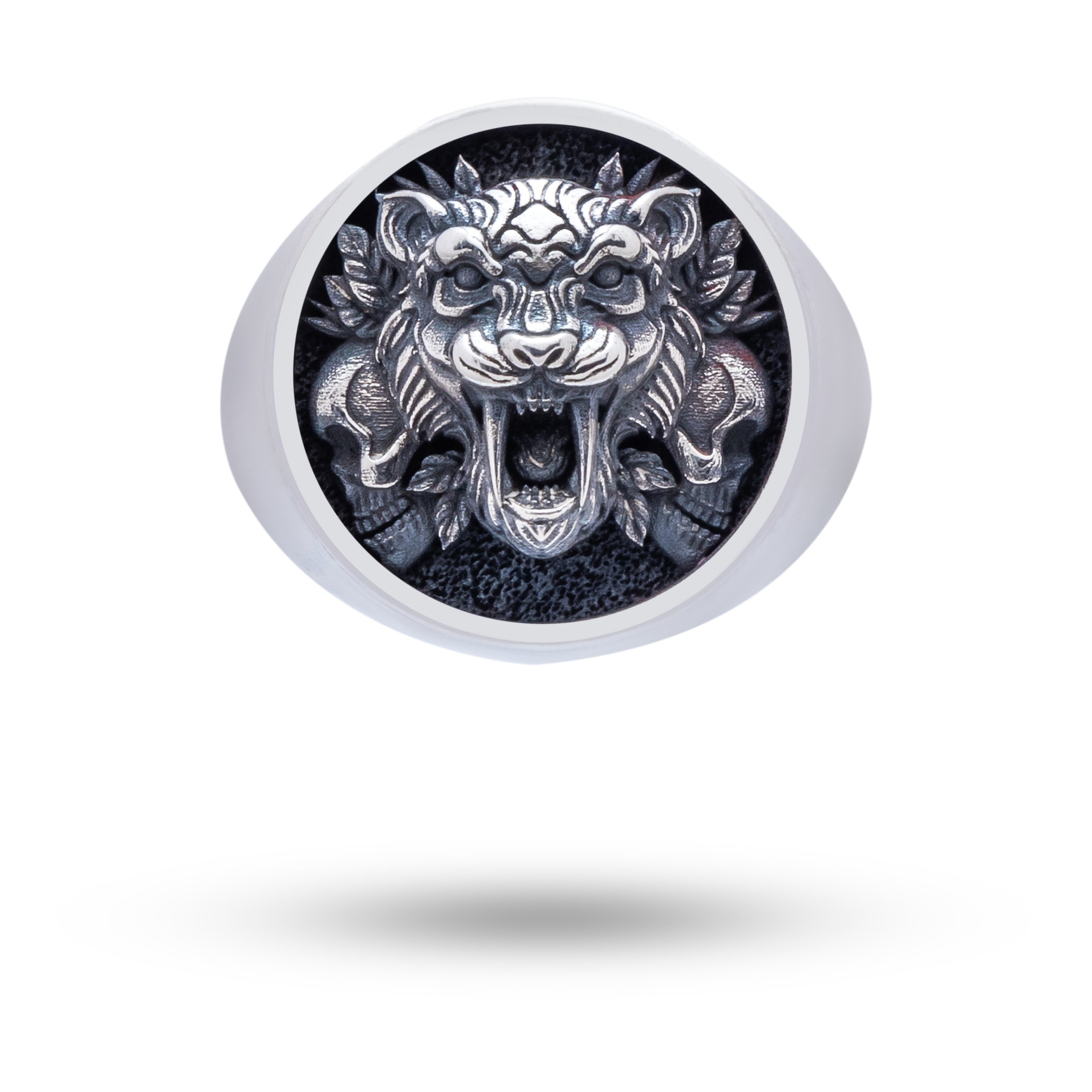 Angle view of Saber Tiger Skulls 925 Sterling Silver Ring showing detailed skull motifs.