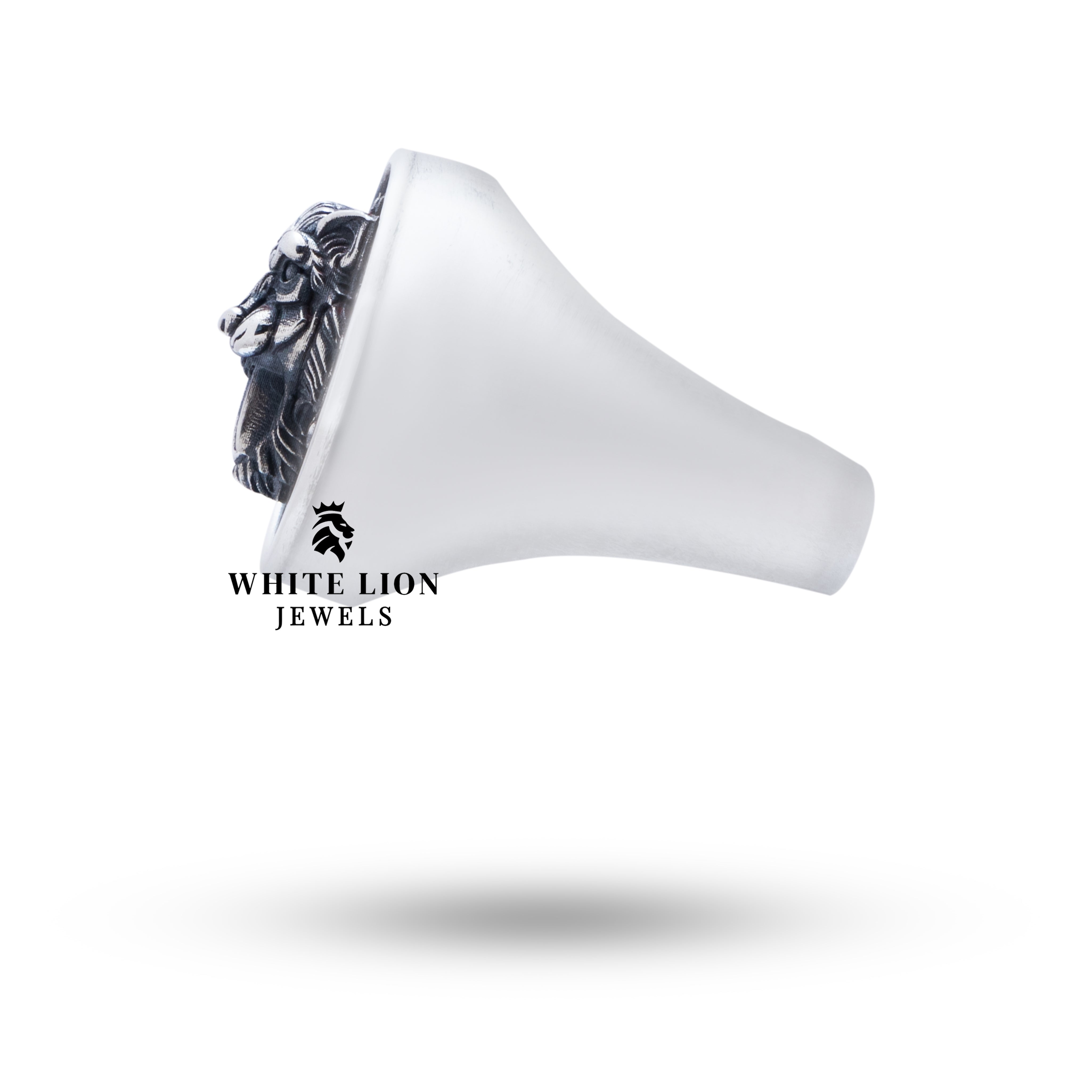 Close-up on Saber Tiger Skulls 925 Sterling Silver Ring design showing craftsmanship.