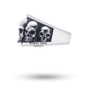 Angled view of Five Skulls 925 Sterling Silver Ring showcasing oxidized finish.