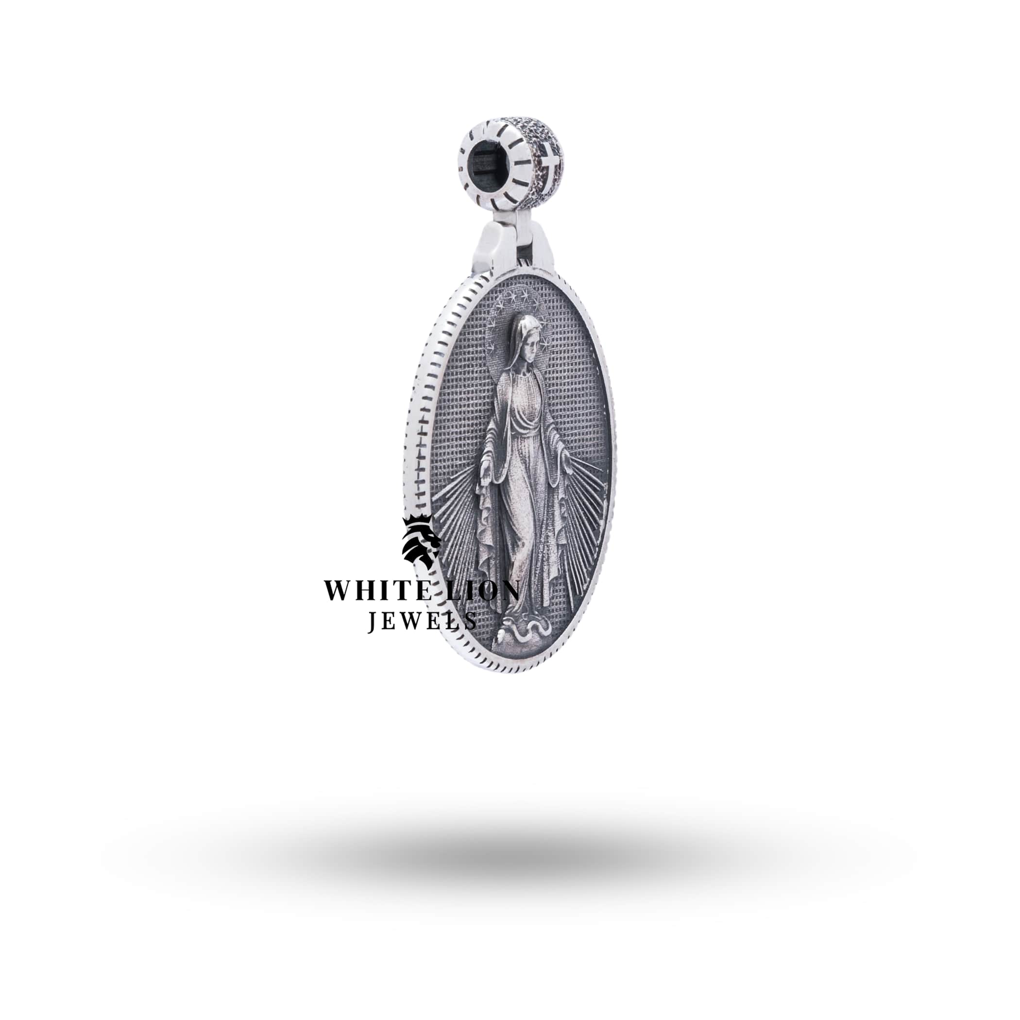 Side view of the Virgin Mary 925 Sterling Silver Pendant showcasing fine craftsmanship and oxidized silver finish.