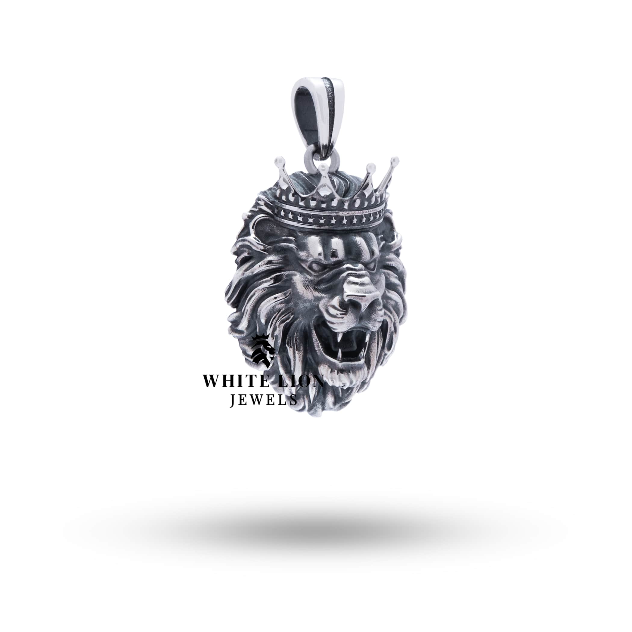 Side angle of Lion King Crown Sterling Silver Pendant highlighting intricate detailing.