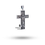 Handcrafted Christ Crucifix Pendant in sterling silver with artistic engravings, ideal for spiritual occasions