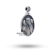 Side view of handcrafted Jesus Shepherd 925 Sterling Silver Pendant showcasing the oxidized silver texture and detailed artwork