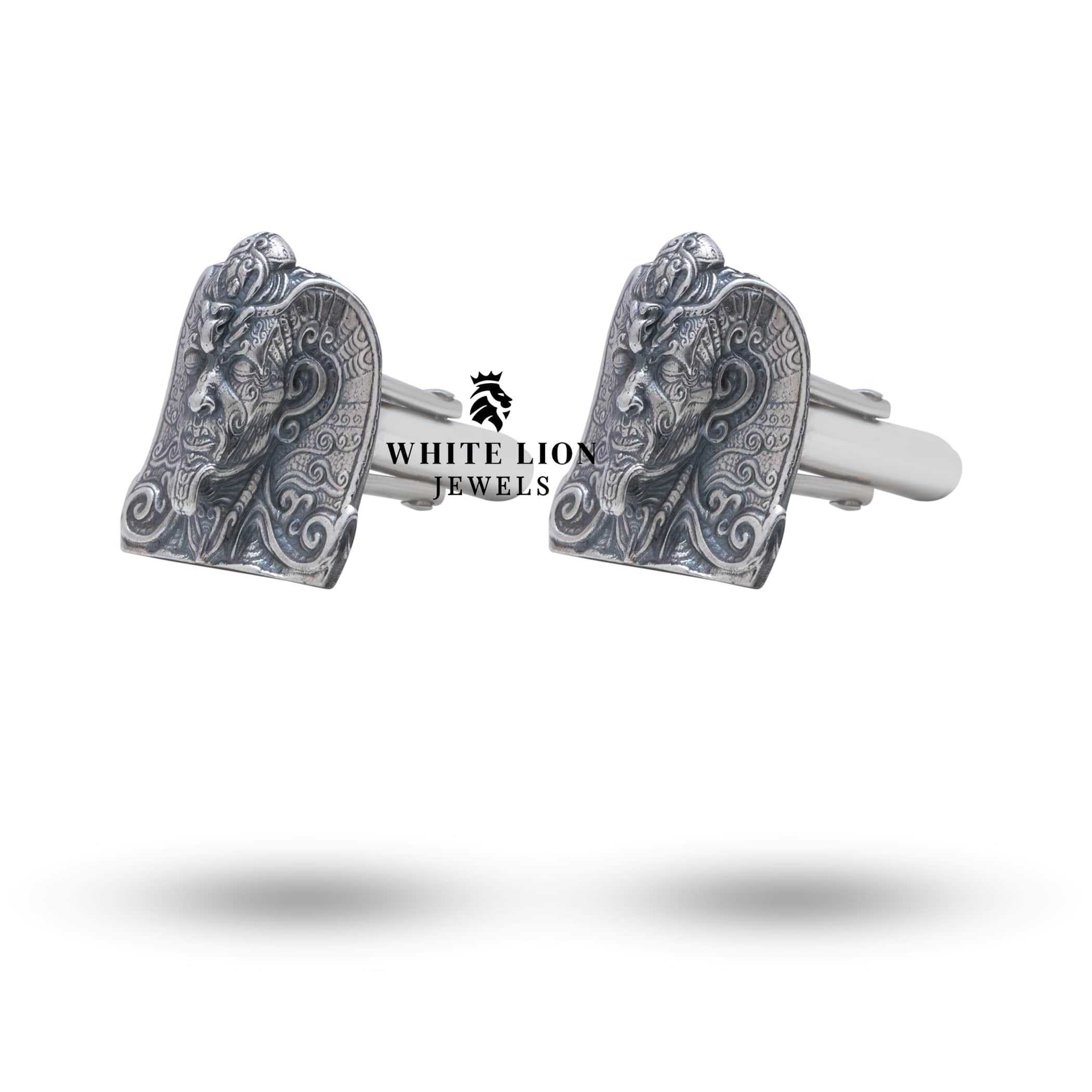 Close-up of luxury 925 sterling silver Pharoah cufflinks with meticulous craftsmanship for elegant occasions.