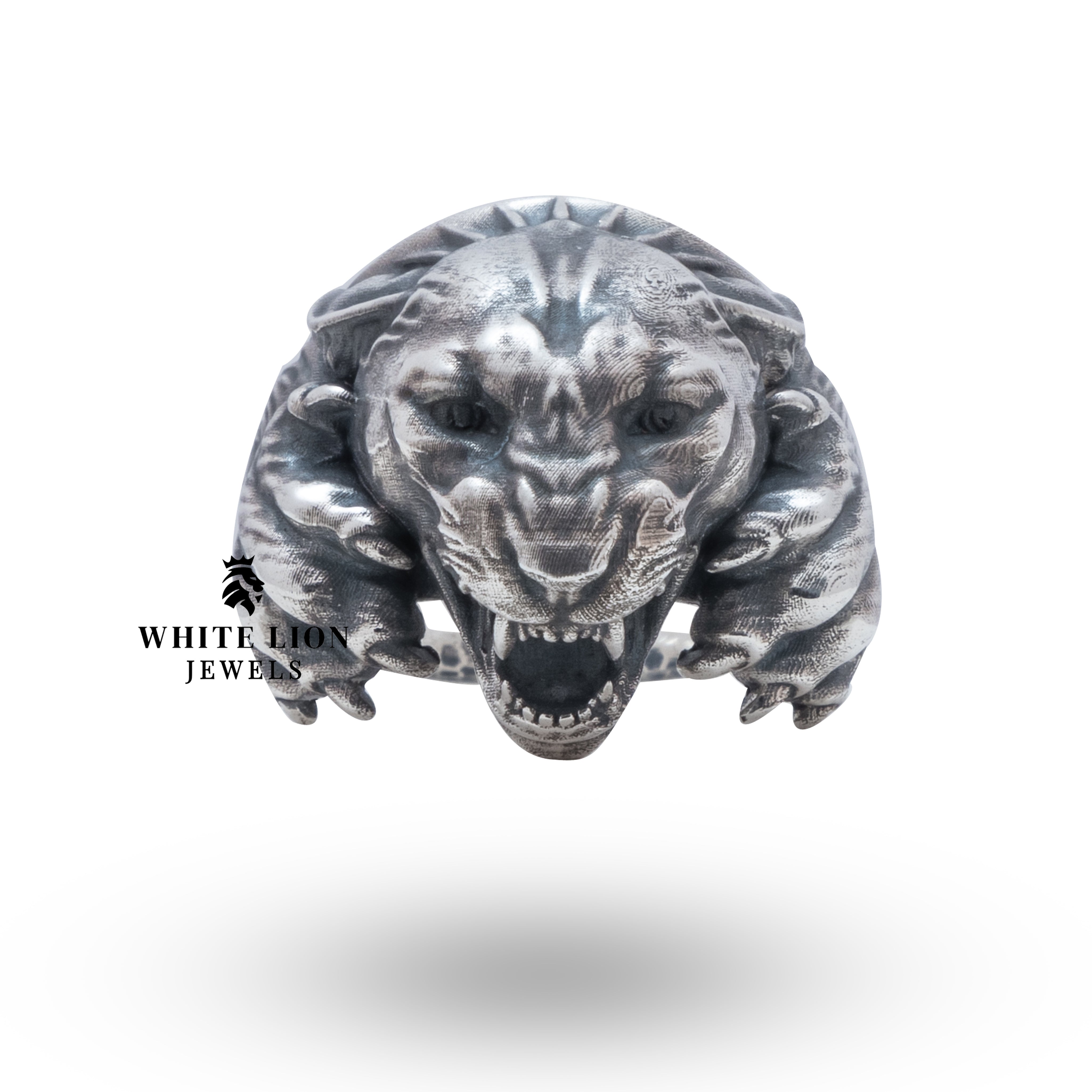 Detailed view of the panther design on the silver ring