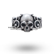 Side view of Pattern Skull 925 Sterling Silver Ring highlighting the detailed skull motif and oxidized finish.
