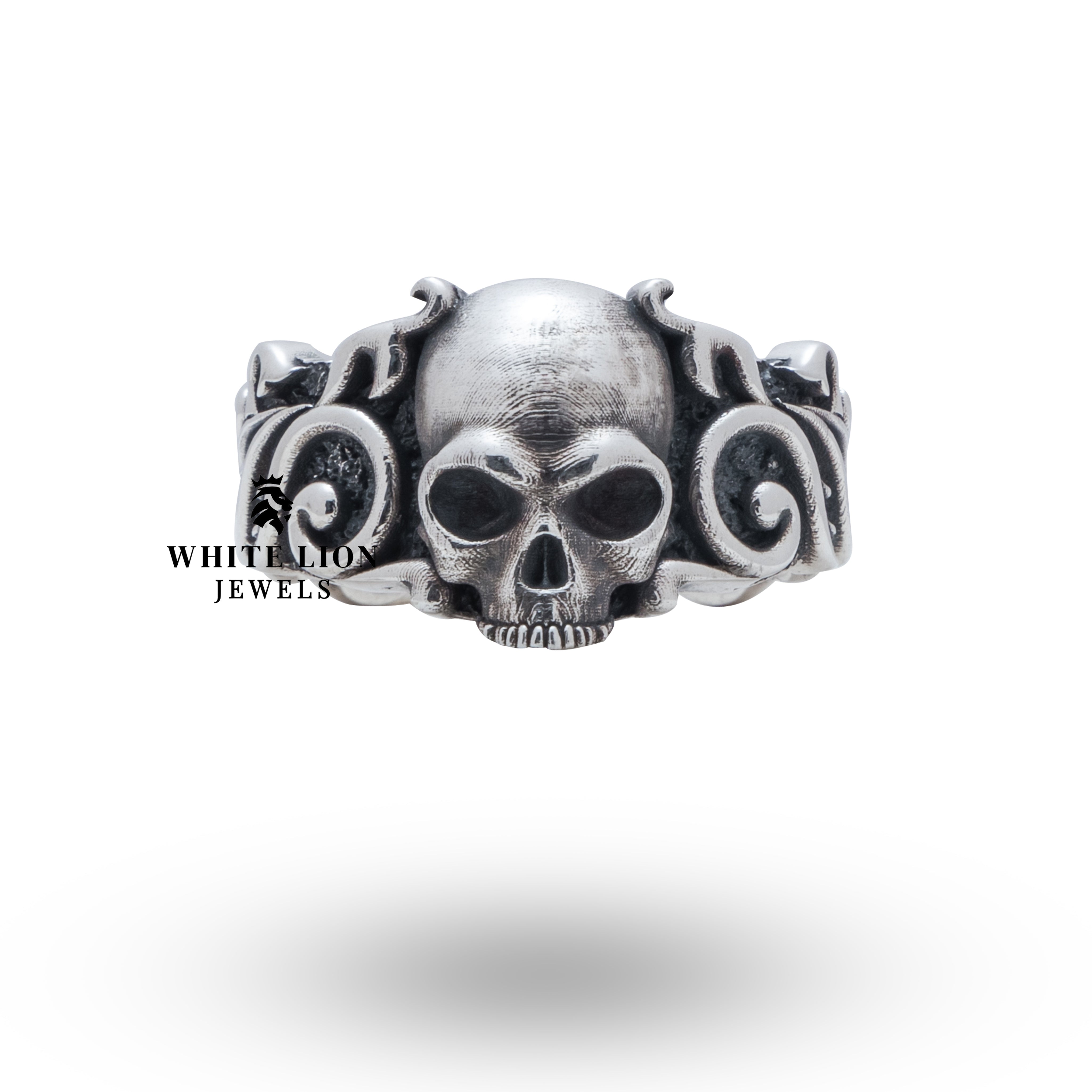 Side view of Pattern Skull 925 Sterling Silver Ring highlighting the detailed skull motif and oxidized finish.