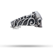 Perspective view of Pattern Skull 925 Sterling Silver Ring showcasing the artistry and bold design.