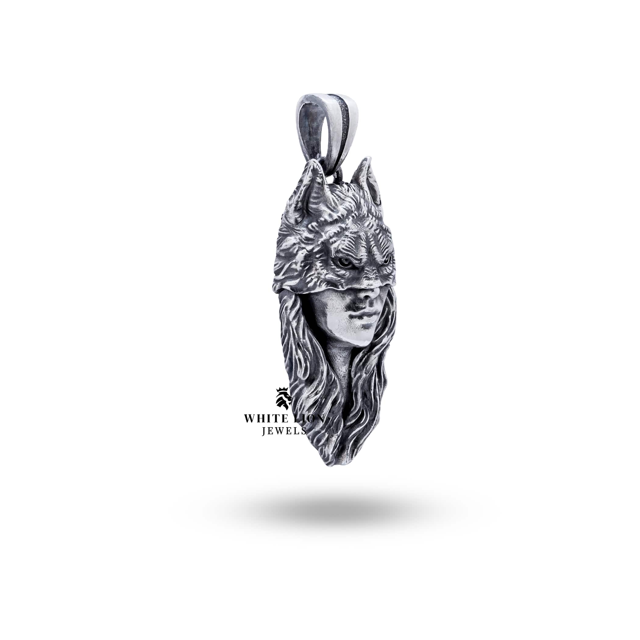 Side view of Wolf Women Mask Sterling Silver Pendant showcasing detailed craftsmanship and unique design