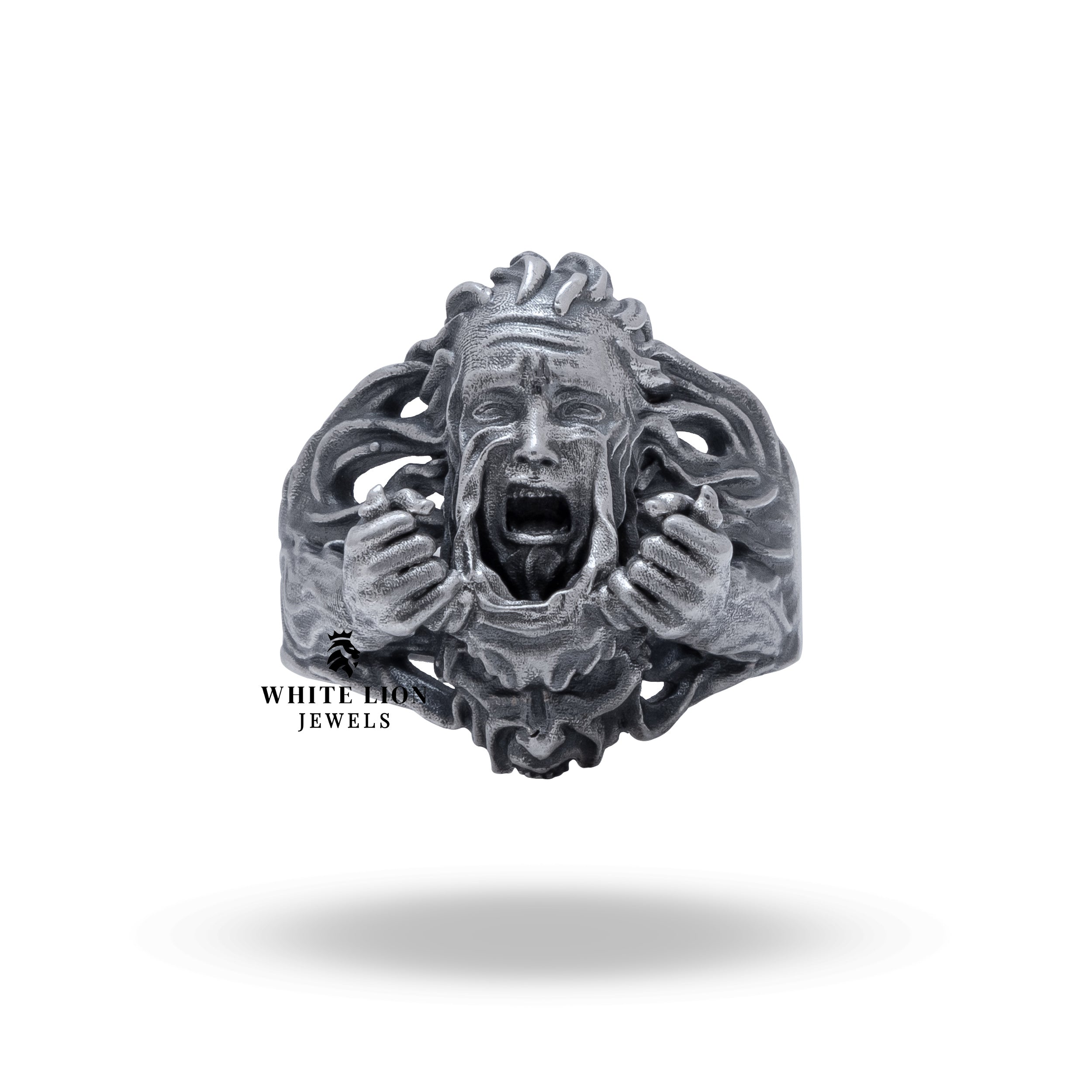 Side view of the Scream Mask Transformation 925 sterling silver ring with oxidized silver finish.
