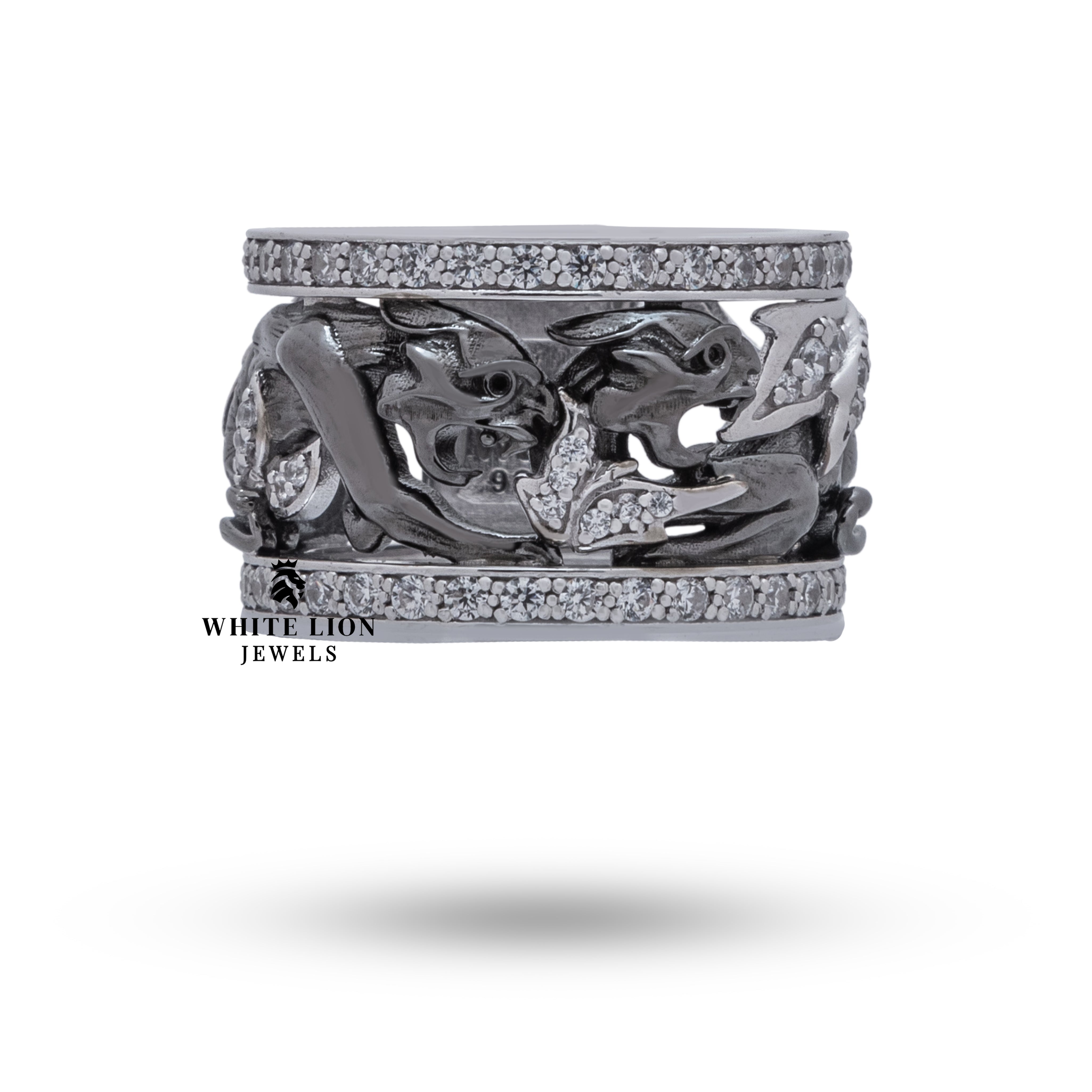 Side view detail of the artisan crafted Puma Two-Tone Silver Ring