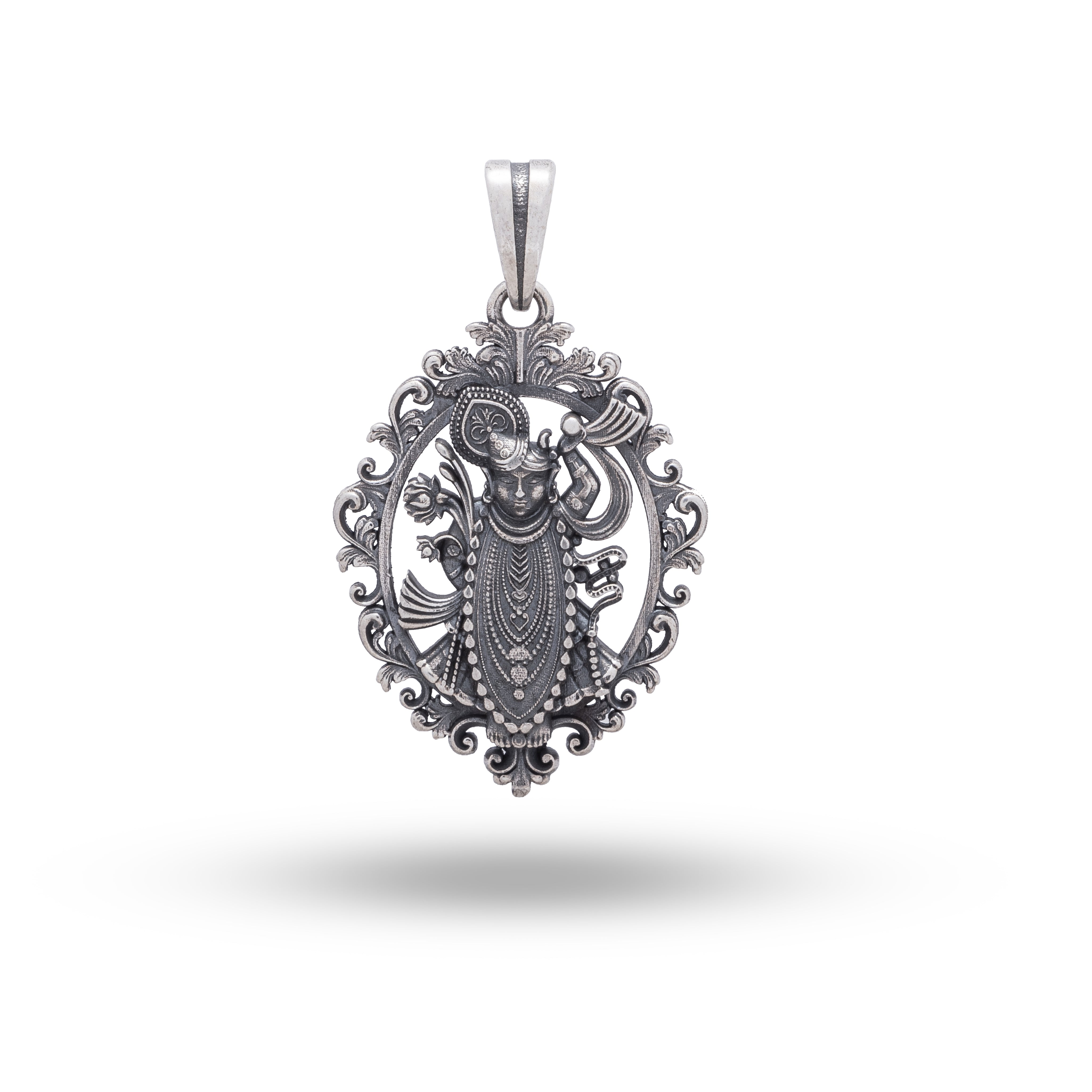 Sterling silver pendant depicting Lord Krishna, featuring oxidized finish and intricate design.