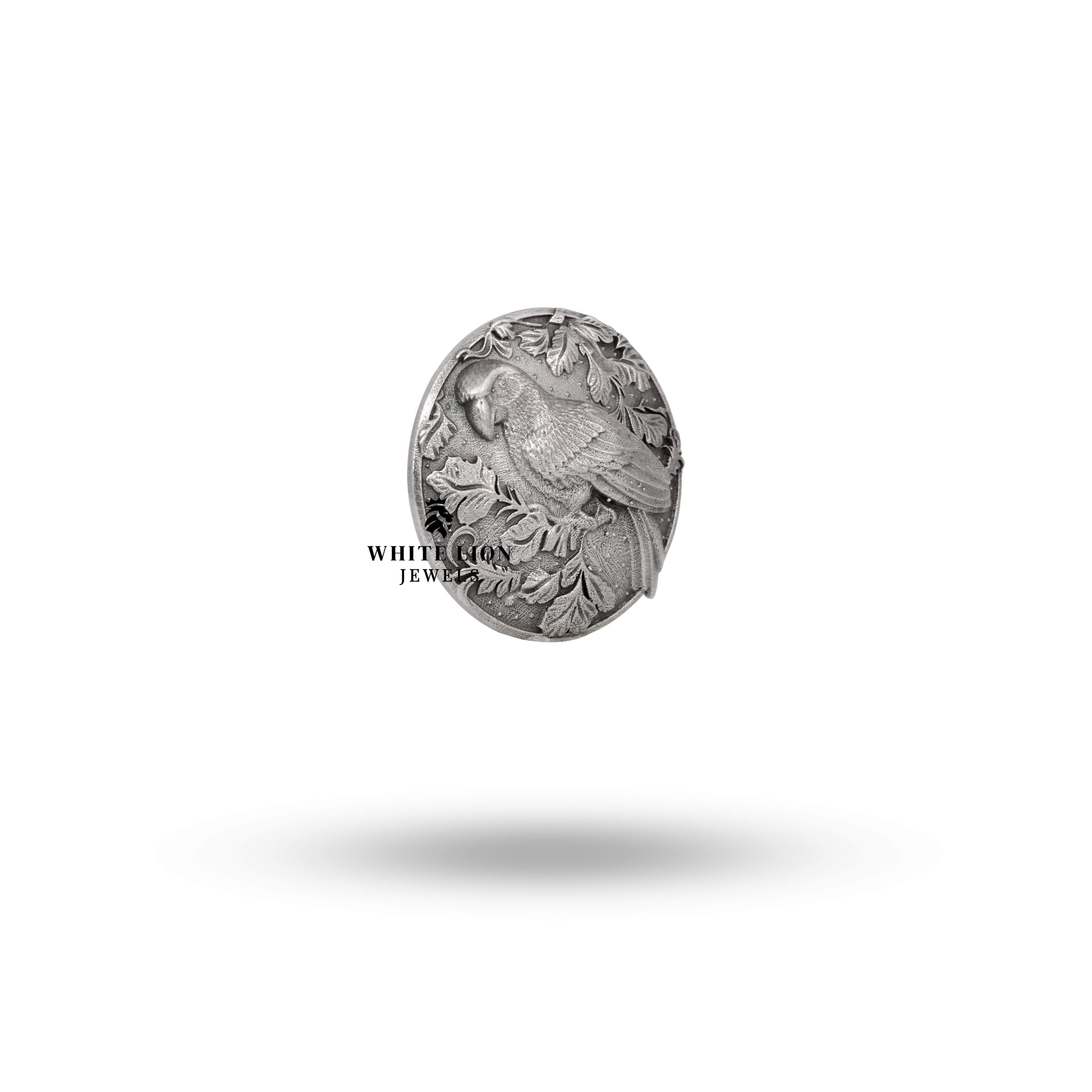 Side view of the Parrot Bird Button Set, demonstrating the artisanal craftsmanship and clarity of the silver.