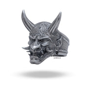 Close-up of the handcrafted Oni Mask Ring, showcasing fine detail and nickel-free composition.