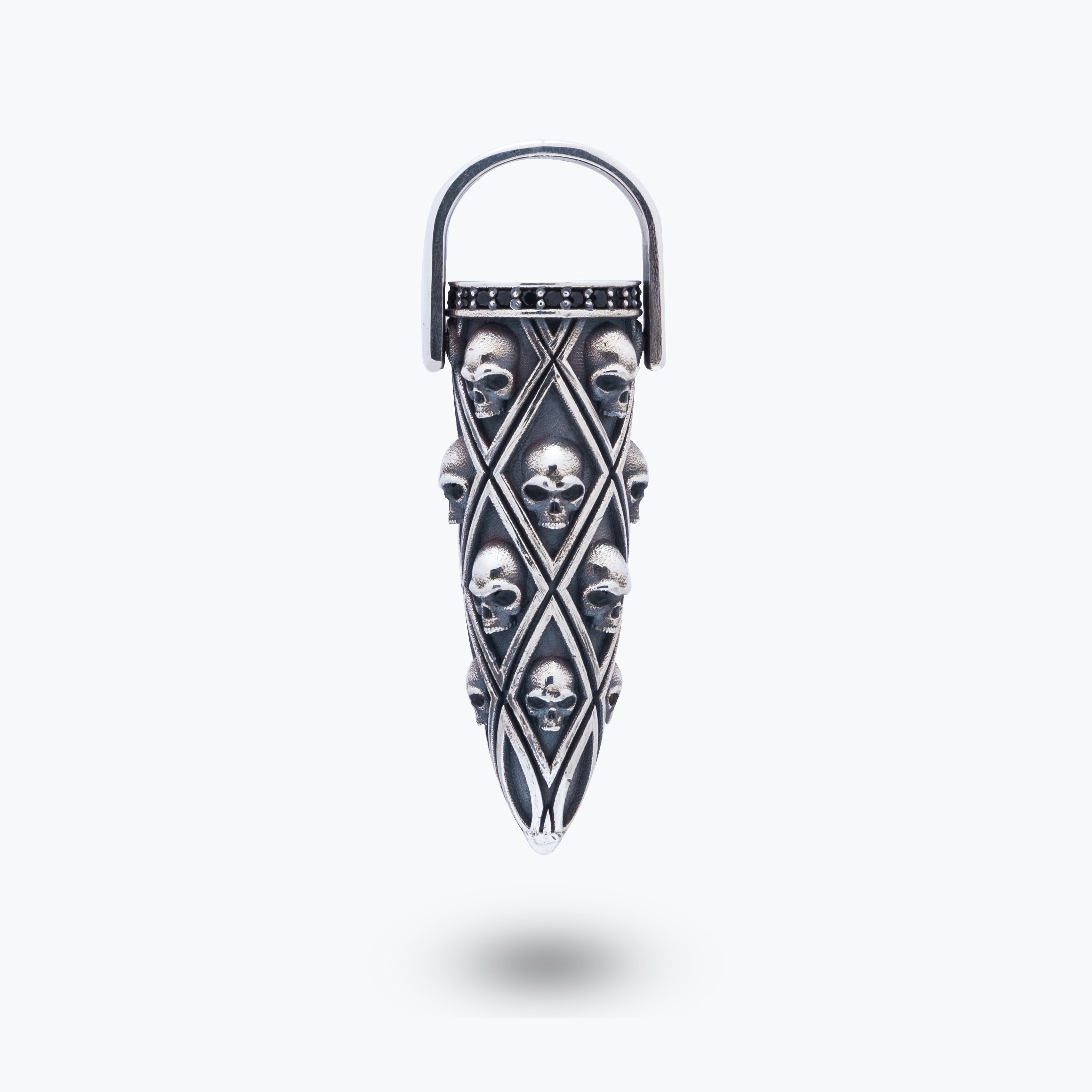 Gothic skulls pistol design pendant in sterling silver with black cubic zirconia stones.