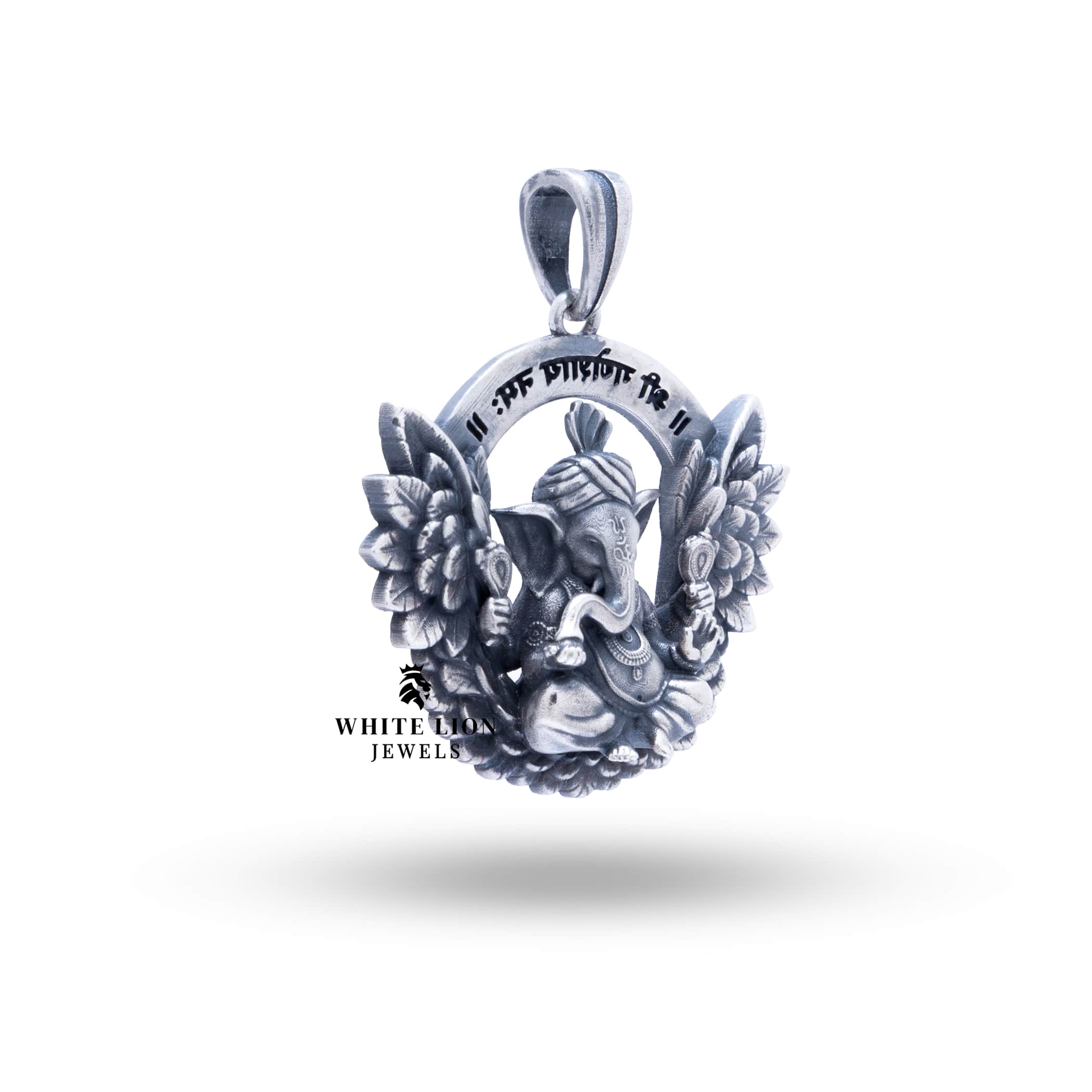 Side profile of the Ganesha Atharva Wings pendant in 925 oxidized silver, highlighting the intricate detailing and wing design.