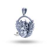 Detailed close-up of Medusa Wings Pendant highlighting the artistic engravings