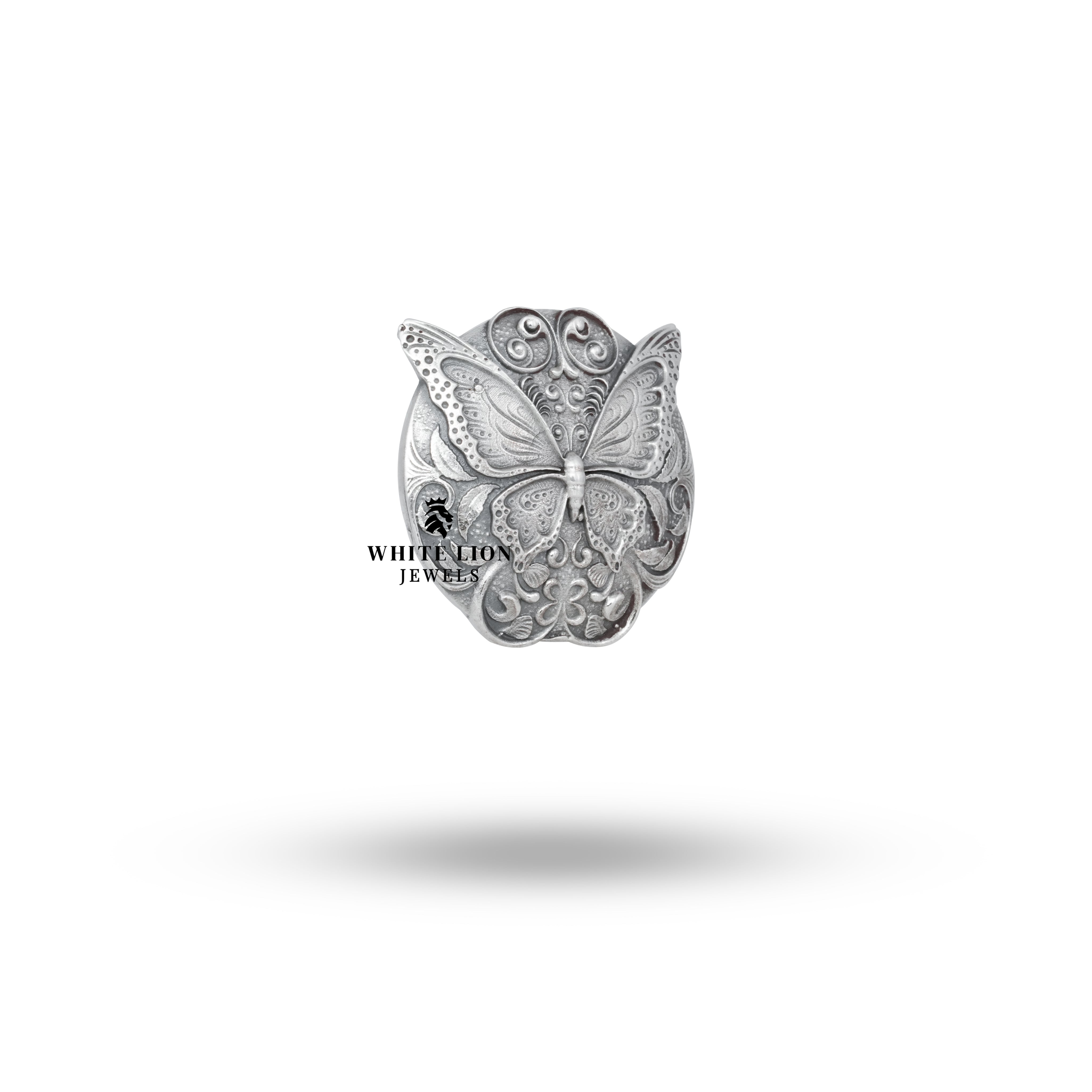 Close-up detailing of the Artistic Butterfly Button Set, highlighting craftsmanship in oxidized silver.