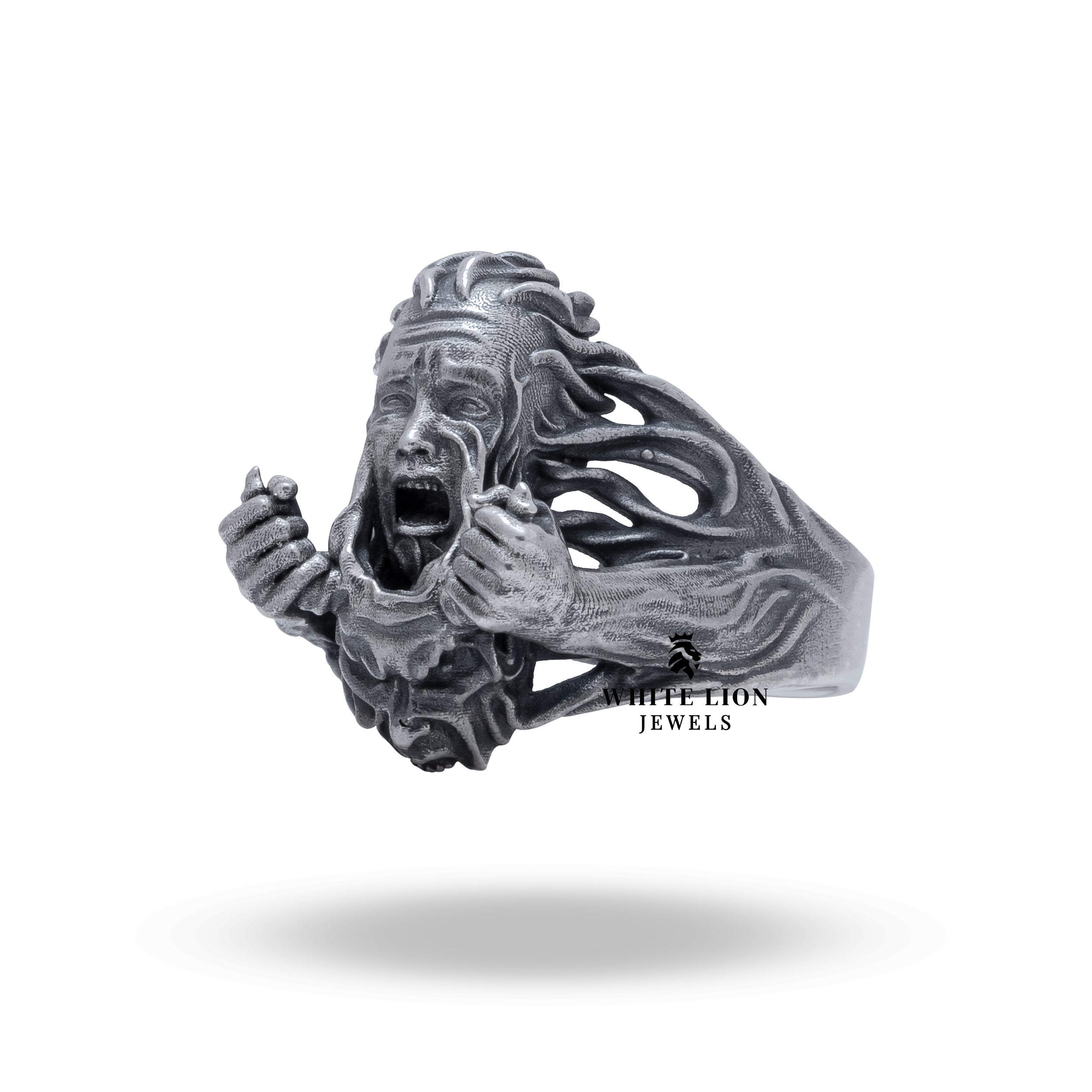 Close-up of the Scream Mask Transformation ring's detailed craftsmanship in sterling silver.