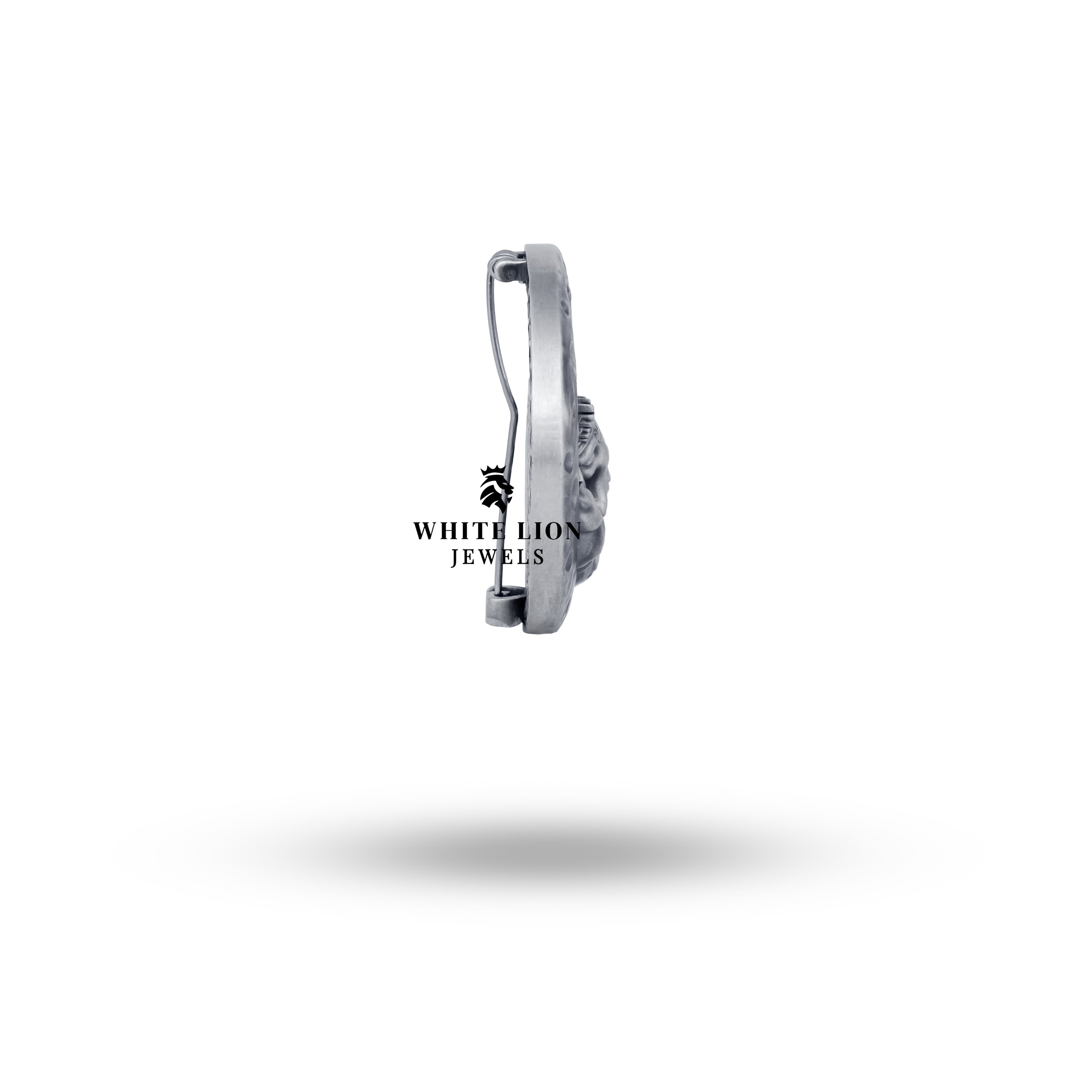 Model wearing Bal-Ganesha sterling silver brooch on a blazer.