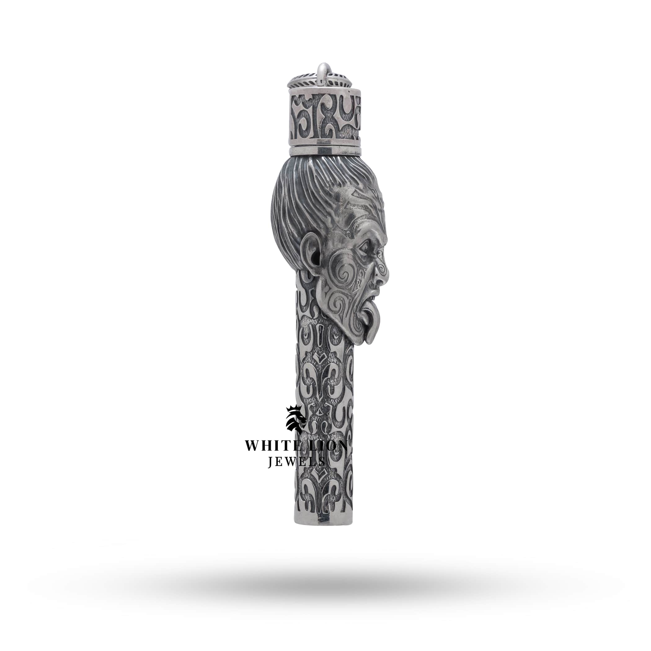 Angled view of Maori 925 Sterling Silver Lighter highlighting detailed oxidation and unique cultural motifs