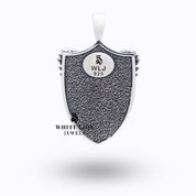 Close-up of St Michael Peiercing Devil Pendant illustrating its detailed artisan work and oxidized finish.