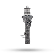 Angled view of sterling silver skull lighter, highlighting nickel free and protective coating features.