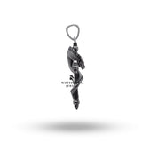 Styled look featuring Dragon Skull Cross silver pendant against dark monochromatic outfit