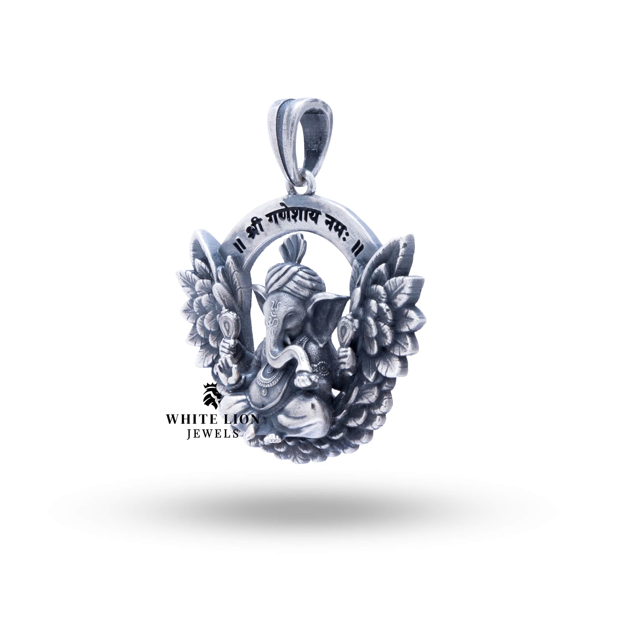 Back view of the Ganesha Atharva Wings 925 Sterling Silver Pendant showing the smooth finish and detailed artwork.