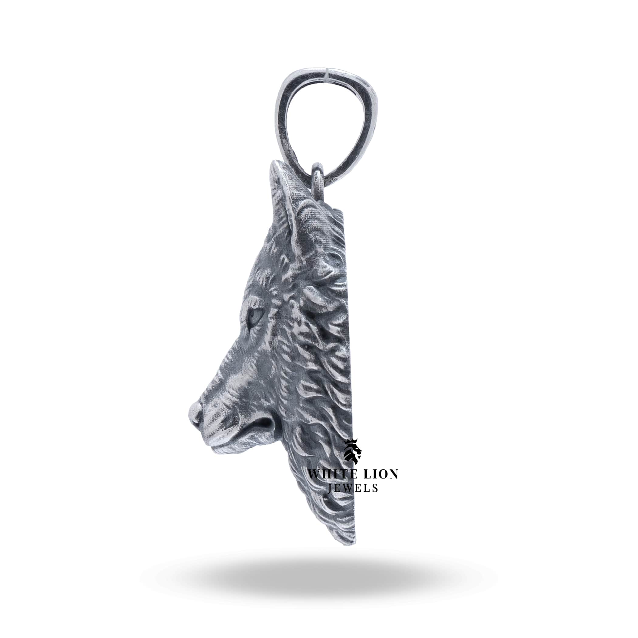 Wild Wolf Head Pendant in oxidized sterling silver by White Lion Jewels displayed on leather cord.