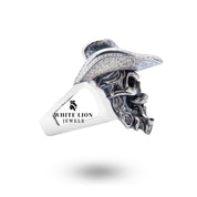 Gangster Gothic Hat Pipe Skull Ring worn on a hand, exhibiting its bold and edgy styling.