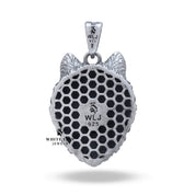 Artistic capture of a 925 Sterling Silver Wolf Head Pendant with elegant oxidized look.