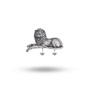 Front view of the expressive lion sitting shoulder brooch made in 925 sterling silver with oxidized finish.