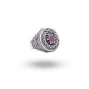 Ouroborus Dragon Silver Ring with Garnet stone showcasing a mystical design.