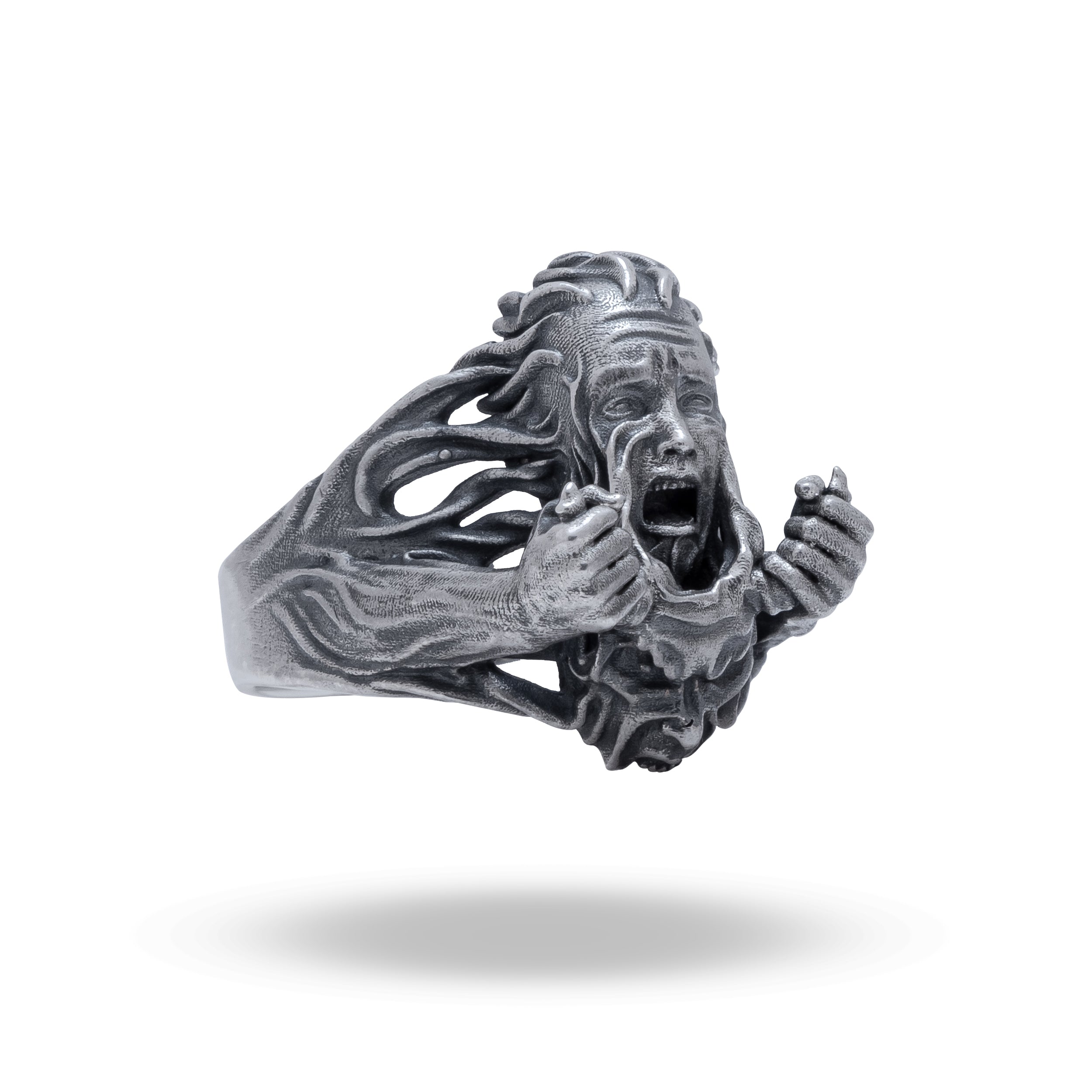 Front view of the Scream Mask Transformation 925 sterling silver ring by White Lion Jewels showing its intricate design.