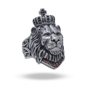 Front view of Calm Lion King Crown Animal 925 Sterling Silver Ring with oxizided finish and garnet stones.
