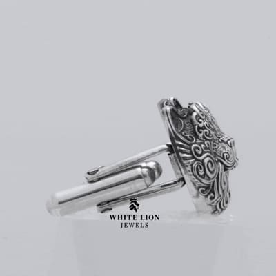 Side view of Cat 925 Sterling Silver Cufflinks showcasing artistic craftsmanship and shine.