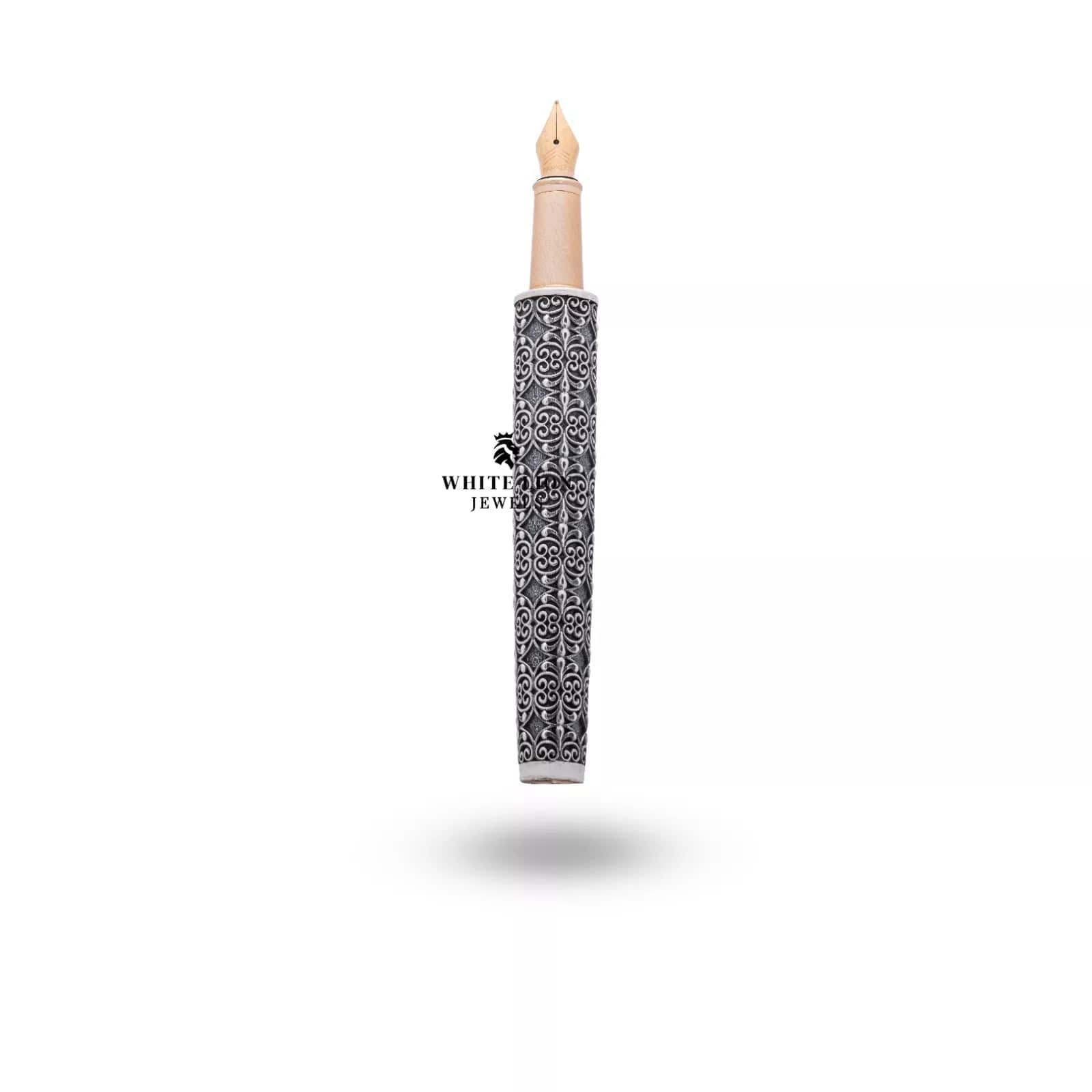 Handcrafted luxury pen in 925 sterling silver, showcasing elegant artisanal detailing.