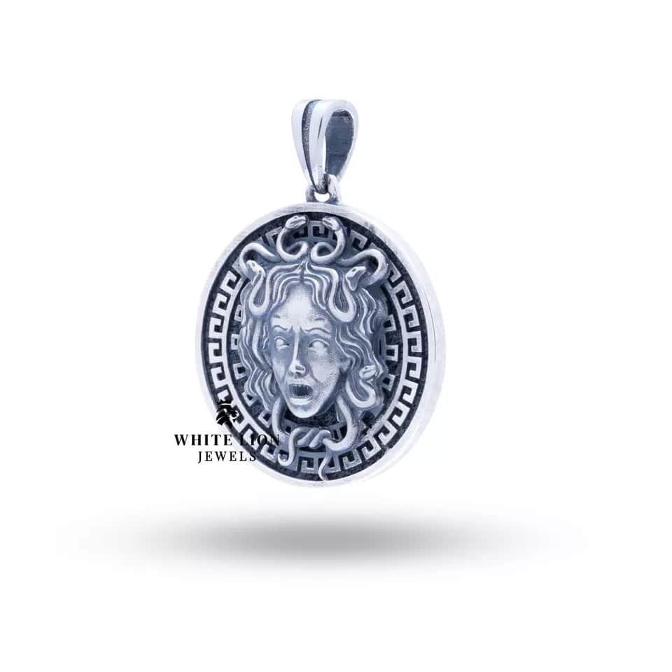 Styled image of Round Medusa 925 Sterling Silver Pendant worn on a chain, perfect for elegant occasions.