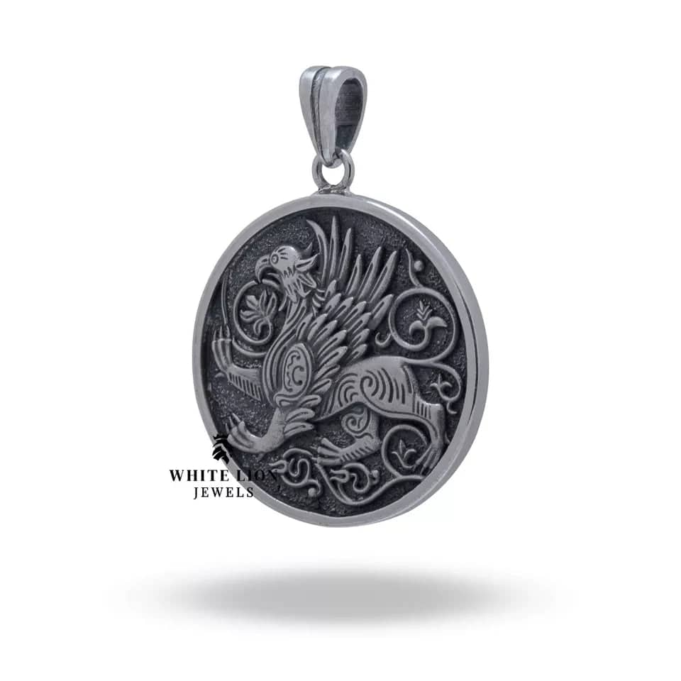 Close-up of Gryphon Creature silver pendant showcasing its intricate design on oxidized surface