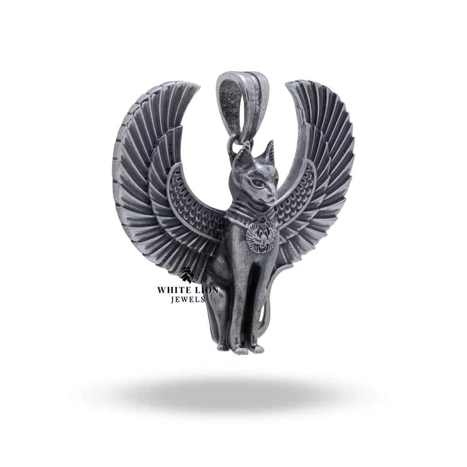 Detailed view of the Winged Egyptian Cat Pendant with oxidized silver finish and fine craftsmanship.