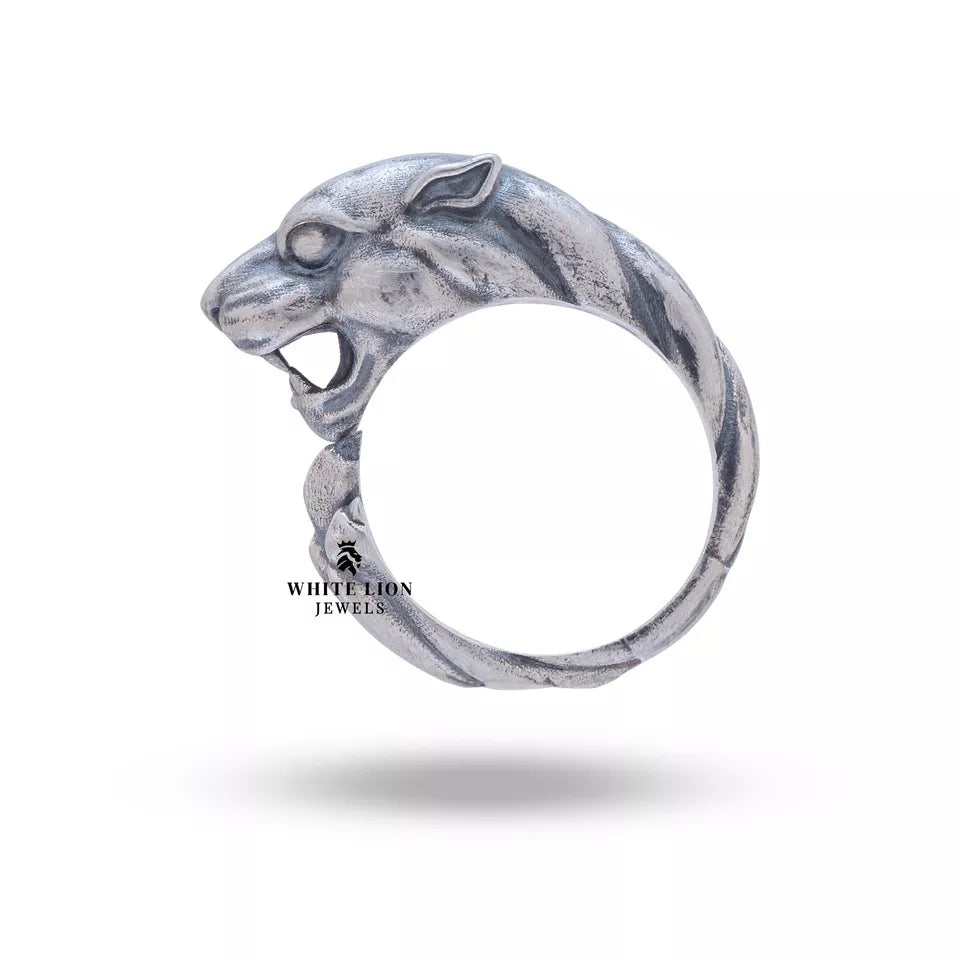 Close-up of the Panther detailing on Sterling Ring demonstrating unique animal motif design.