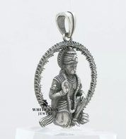 Side view of Hanuman Pendant depicting detailed artisan work in oxidized 925 Sterling Silver